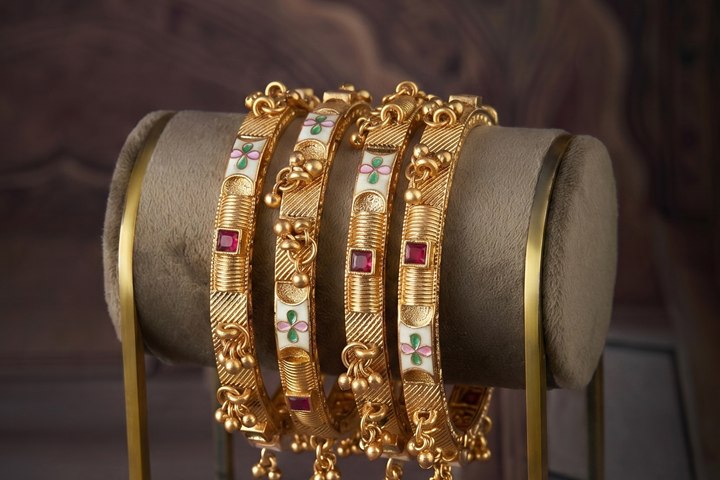 Golden metal bangles from Mahalaxmi Bangles